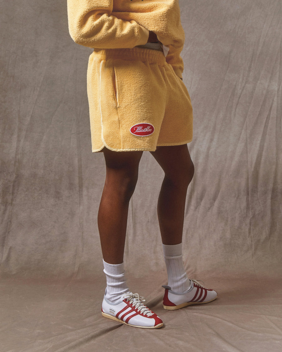 REVERSE SPELLOUT SPORTS SHORTS - MIMOSA